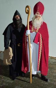 Samichlaus and Schmutzli in traditional Swiss costume.